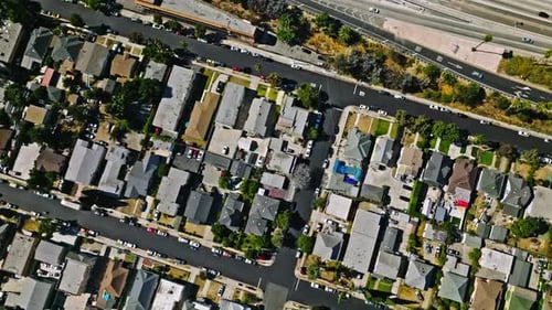 Streets with Traffic Houses and Trees Los Angeles Suburbs in California USA