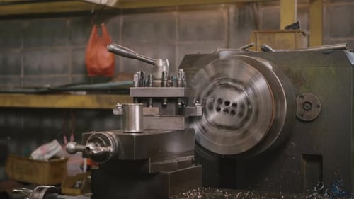 Metal Lathe Shaping Metal in Workshop