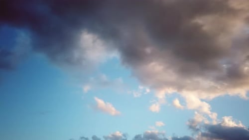 Clouds at Sunset in Fast Movement to the Left in Berlin City