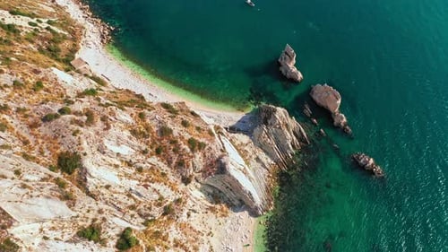Aerial Top View of White Beachrocky Cliffsblue Seadeep White Cliffs