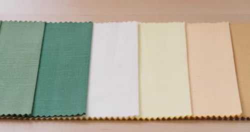 Colorful Fabric Swatches With Hand Testing Material