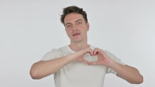 Man Making Heart Shape with Hands