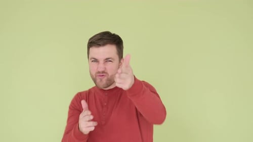 Man Making Finger Gun Gesture