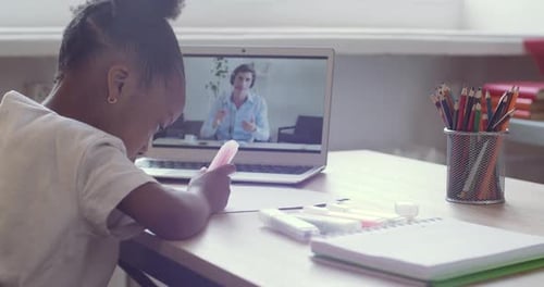 Child Engaged in Online Learning at Home