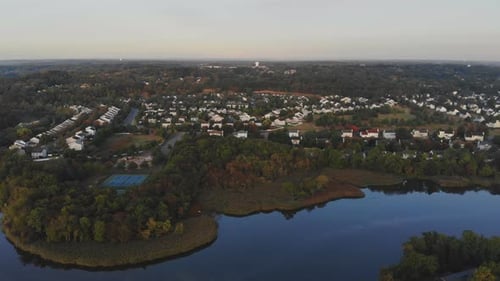 Aerial View of Town Along the River with Residential Areas of Private Houses Bench in Autumn