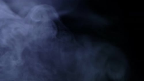 Billowing Luminous Smoke on a Black Background