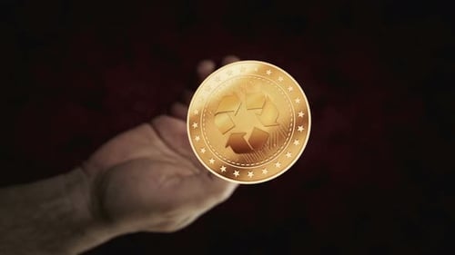 Hand Flips Animated Recycling Coin