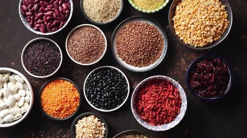 Assortment of Colorful Grains, Beans, and Dried Fruits