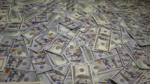 Pile of US One Hundred Dollar Bills