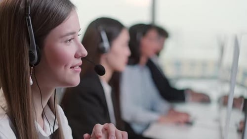 Close Up Portrait of Woman a Technical Customer Support Specialist Talking on a Headset While