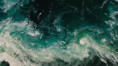Waves of Water of the River and the Sea Meet Each Other During High Tide and Low Tide