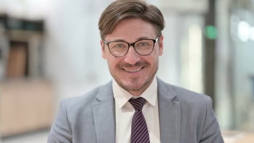 Smiling Adult Man Close-Up in a Business Suit