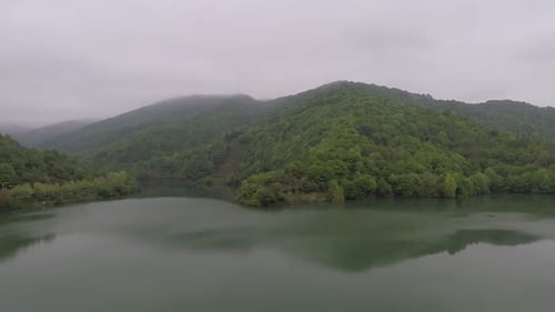 Aerial Hill Reflection in Lake