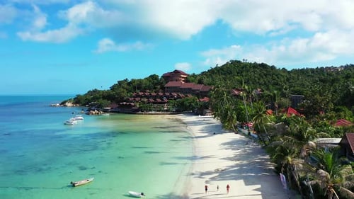 Paradise vacations destination with luxurious waterfront resort near exotic beach with white sand wa