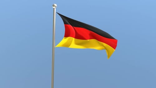 German Flag Waving on Flagpole with Blue Sky