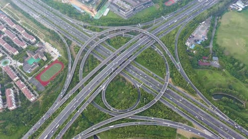 Aerial view of highway and overpass in city