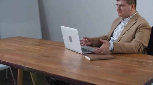 Businessman Video Calling in Office