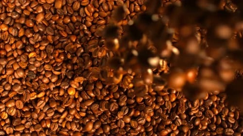 Falling Roasted Coffee Beans Fill the Frame