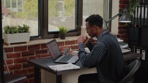 Stressed Employee Failing to Do Financial Presentation on Laptop