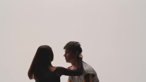 Elements of Modern Choreography Contemporary Performed By Couple of Dancers on White Studio