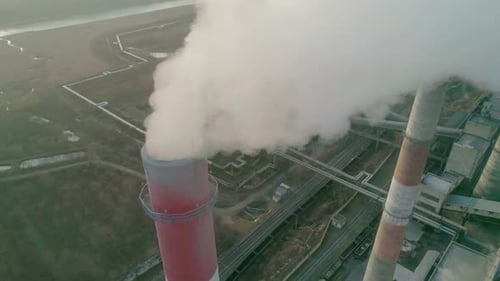Aerial Drone View Tall Chimney Pipes Grey Smoke From Coal Power Plant