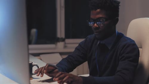 Black Man Working in Office
