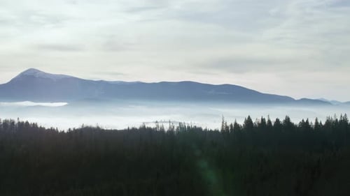 Panoramic View on the Snowy Mountain Ridge
