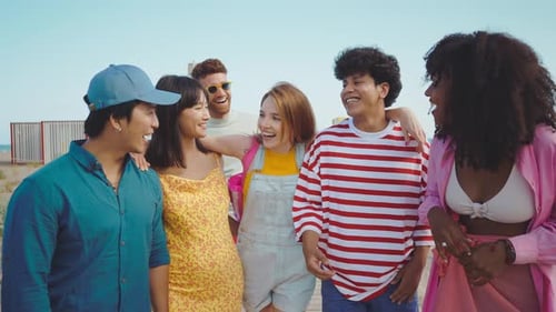 Group of friends having fun on the beach.