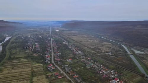 Aerial Top Dow View Over Suburb Area Village Near Mountain High Altitude View Over Countryside of