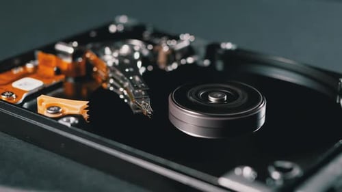 Hard Disk Drive Inside. Structure of HDD, Spinning Platter. Move Magnetic Head