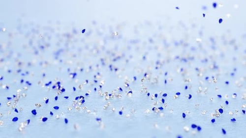 Falling Blue and Silver Glitter Particles Animation