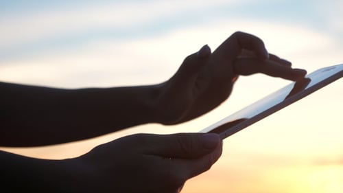 Woman hands holding digital tablet pc and touching with