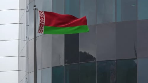 Belarus Flag Waving on Flagpole with Modern Building
