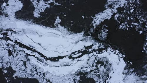 Aerial View of Frigid River with Ice and Snow