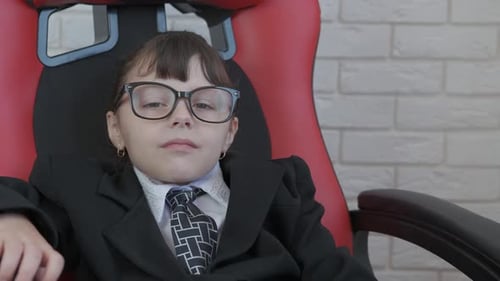 Child in Oversized Suit with Funny Tie