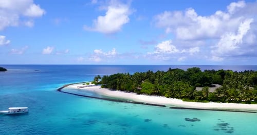 Beautiful aerial island view of a white sand paradise beach and aqua blue ocean background in 4K