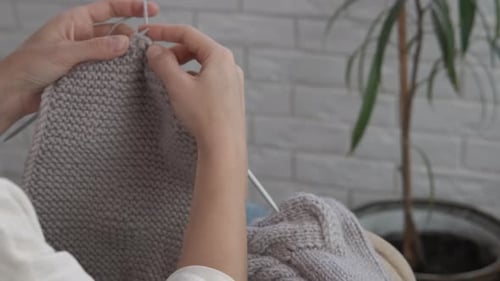 Hands Knit Warm Wool Garment at Home