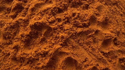 Close Up of Pile of Brown-Orange Powdered Spice