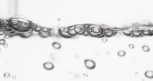 Clear Water Bubbles Pouring Macro Shot