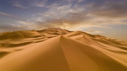 Sunset Over the Sand Dunes in the Desert