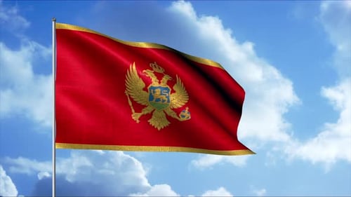 Montenegro National Flag Waving in Blue Sky with Clouds