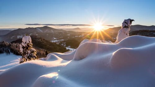 Snowy Mountains at Sunrise in Winter Landscape