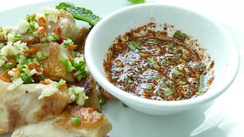 Grilled Chicken with Dipping Sauce on Plate