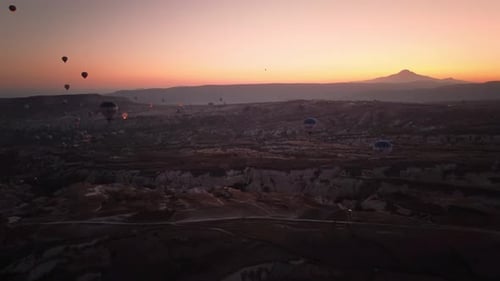 Hot Air Balloons Soaring at Sunrise Over Cappadocia