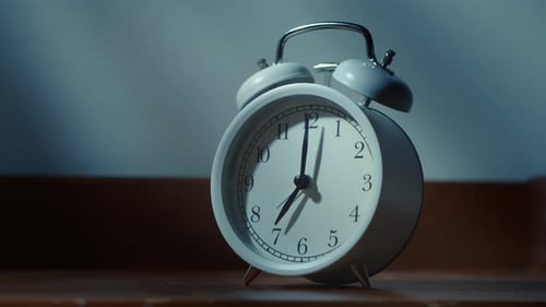 Vintage Alarm Clock Displaying Seven O'Clock