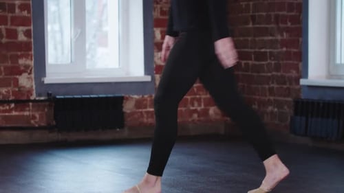 Gymnastics Young Flexible Woman Leaning on Her Leg and Bending Backwards Holding Another Leg Close