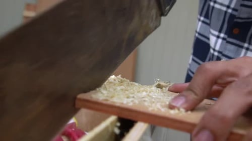 Carpenter Working on Wood Craft at Workshop