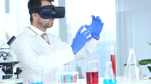 Scientist Using Virtual Reality Glasses for Research and Imagination in Laboratory Vr Goggles