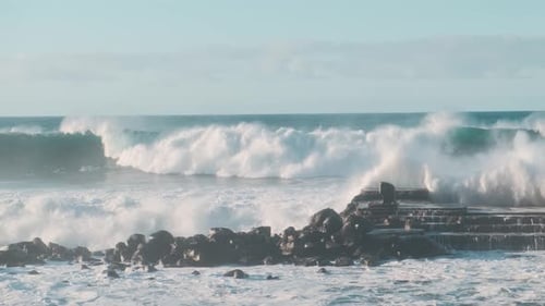 Crashing Ocean Waves on Rocky Shoreline