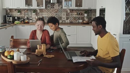 Family Uses Technology Together at Home